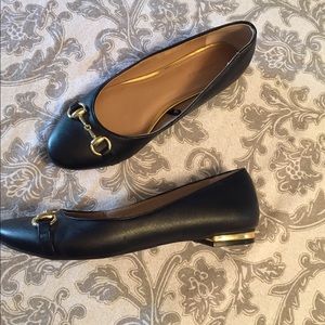 Black faux leather flats!
